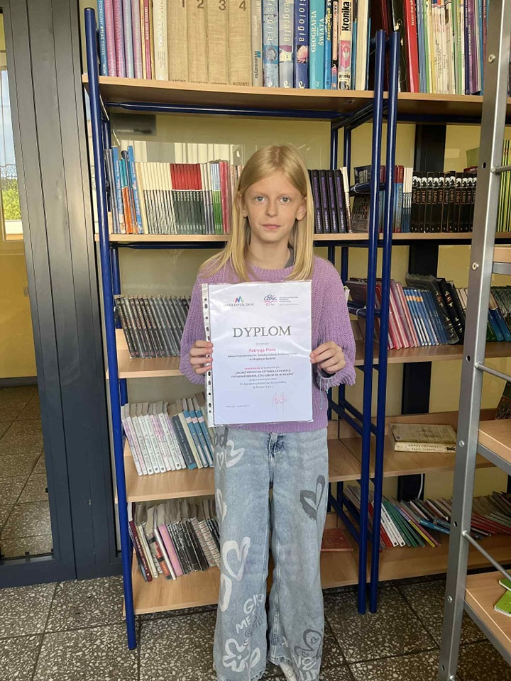 Konkurs „Zachęć innych do czytania za pomocą fotografowania, czyli ubierz się w książkę”